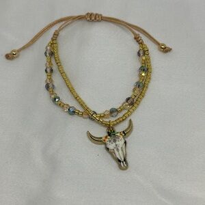 Gold Beaded Bracelet with Bull Skull Charm